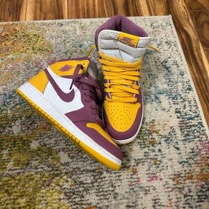 Jordan Purple and Gold High-Top Sneakers